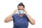 Woman with headache wearing surgical mask for covid19 protection