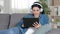 Woman with headphones browsing tablet content