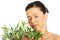 Woman with health skin and with olive tree