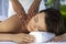 Woman At Health Spa Having Relaxing Massage