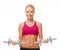 Woman with heavy steel dumbbells