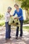 Woman Helping Senior Female With Shopping