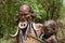 Woman with her baby of the Mursi tribe.
