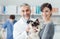 A woman with her cat at the veterinary clinic