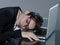 Woman at her desk sleeping