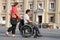 Woman and her disabled husband in the wheelchair