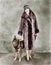 Woman in her Giraffe patterned fur coat and her dog