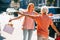 Woman and her mother meeting in the street stock photo