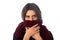 Woman hiding mouth under scarf