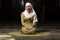 Woman in Hijab Sitting in Mosque and Praying