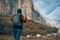 woman hiker admire nature rocky mountains travel