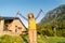 Woman hiker camping near the beautiful shelter stone hut building in Pyrenees mountains. Hiking and adventure concept