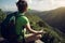 woman hiker drinking water on hiking travel