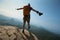 Woman hiker enjoy the view hiking on mountain peak