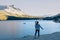 Woman hiker enjoying view of the beautiful lake