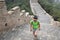 Woman hiker hiking on great wall