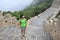 Woman hiker hiking on great wall