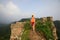 Woman hiker hiking on great wall