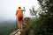 Woman hiker hiking on great wall