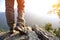 Woman hiker hiking stand on cliff