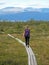 Woman Hiker on the Kungsleden trail, Abisko National Park, Sweden, Europe