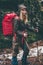 Woman Hiker with red backpack traveling