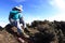 Woman hiker rest and drinking bottled water