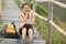 Woman hiker sit on mountain stairs