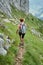 Woman hiker on a steep trail