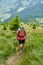 Woman hiker on a steep trail