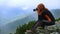 Woman hiker taking a photo