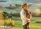 Woman hiker in Tuscany looking into distance