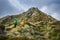 Woman hiker walking on an alpine section of the Kepler Track