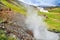 Woman hiking in beautiful geothermal landscape in Iceland