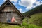 Woman hiking and camping in inspiring mountain landscape