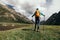 Woman hiking in the high altitude mountains