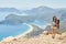 Woman hiking Lycian way with backpack. Fethiye, Oludeniz. Beautiful view of the sea and the beach. Hiking in the mountains of