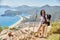 Woman hiking Lycian way with backpack. Fethiye, Oludeniz. Beautiful view of the sea and the beach. Hiking in the mountains of