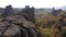 Woman hiking in picturesque rock formations