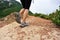 Woman hiking on seaside mountain trail