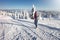 Woman hiking in the snowy mountains