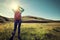 Woman hiking in sunrise mountains