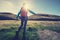 Woman hiking in sunrise mountains