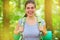 Woman hiking tourist with backpack outdoors portrait