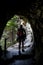 Woman On Hiking Trail Leaves A Cave In Ã–tschergrÃ¤ben In Austria