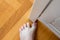 Woman hit furniture with big toe. Incident at home. Injury of foot