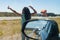 Woman hitch hikes Side mirror on car shows view of motorists stranded Massive traffic pile up on interstate 40 new mexico