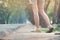 Woman hitchhiker walking on highway road