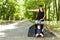 Woman hitchhiking with her son