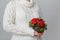 Woman hold a Red Poinsettia bouquet